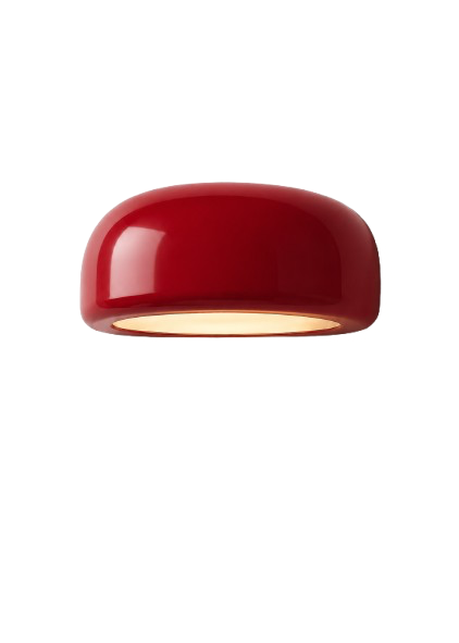 Red capsule-shaped object with a reflective surface, possibly a light fixture or decorative item, isolated on a white background.