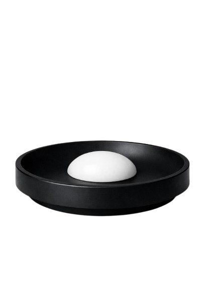 A black electronic device displaying distorted text and a white egg-shaped object on it.