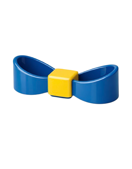 Close-up of a blue plastic bow tie with a yellow center piece.