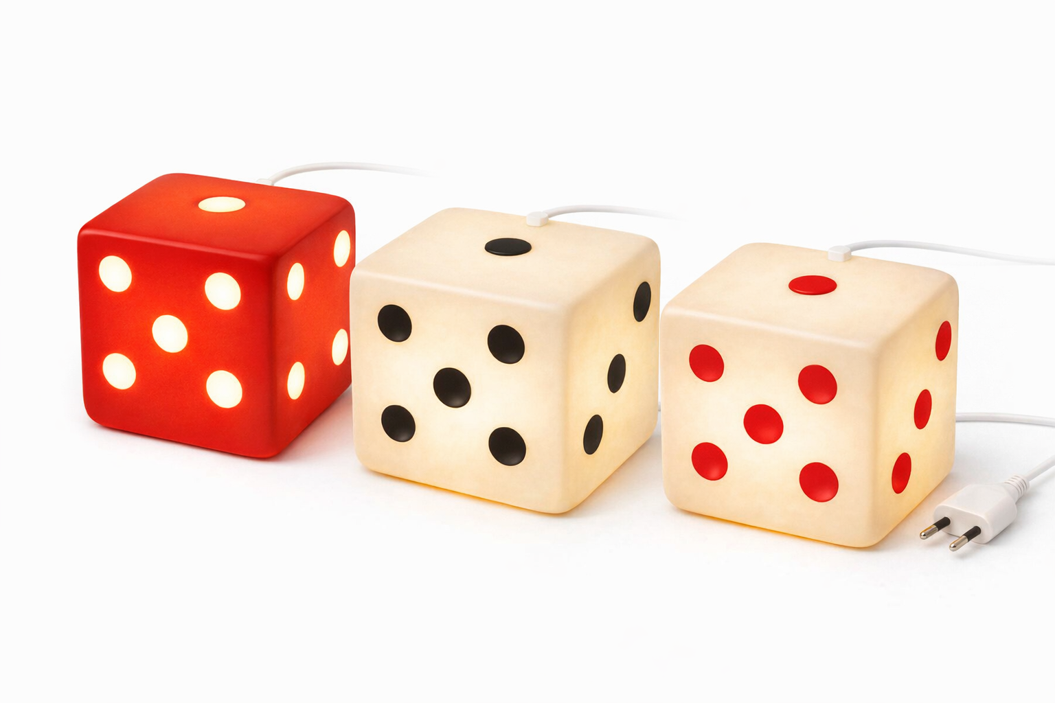 Three illuminated dice-shaped night lights with different color dots: red with white dots, cream with black dots, and cream with red dots, connected to white power cords.