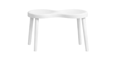 White bench with four angled legs and a rounded top.