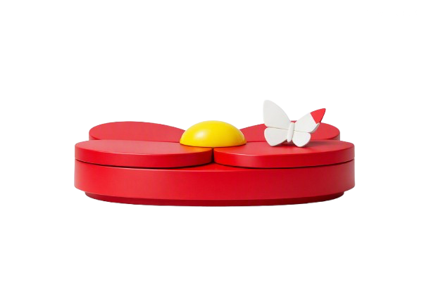 Red circular object with yellow dome and white butterfly decoration on top