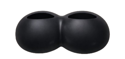 A black, rounded object with two openings on top, resembling a modern ceramic or plastic sculpture or decorative piece.
