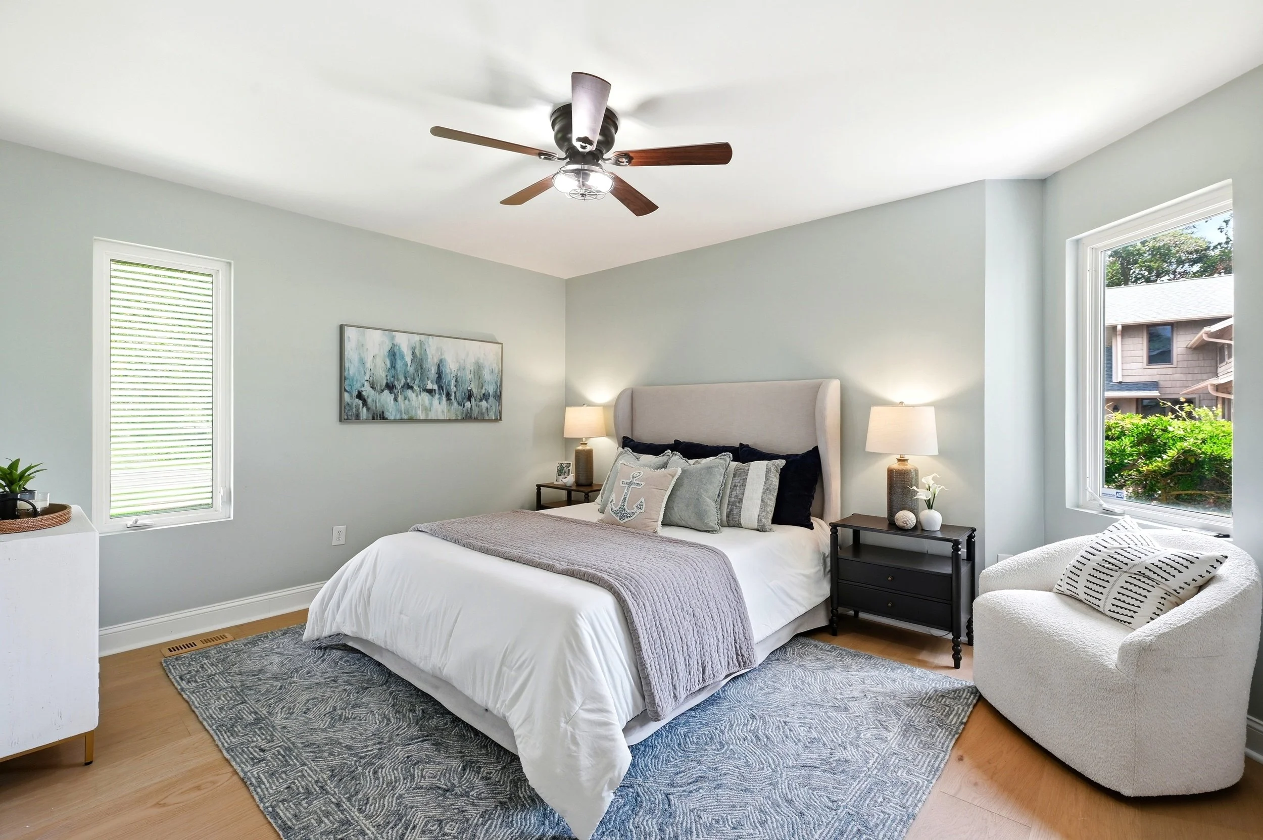 Wilmington NC coastal home bedroom professionally staged with furniture scaled to the room