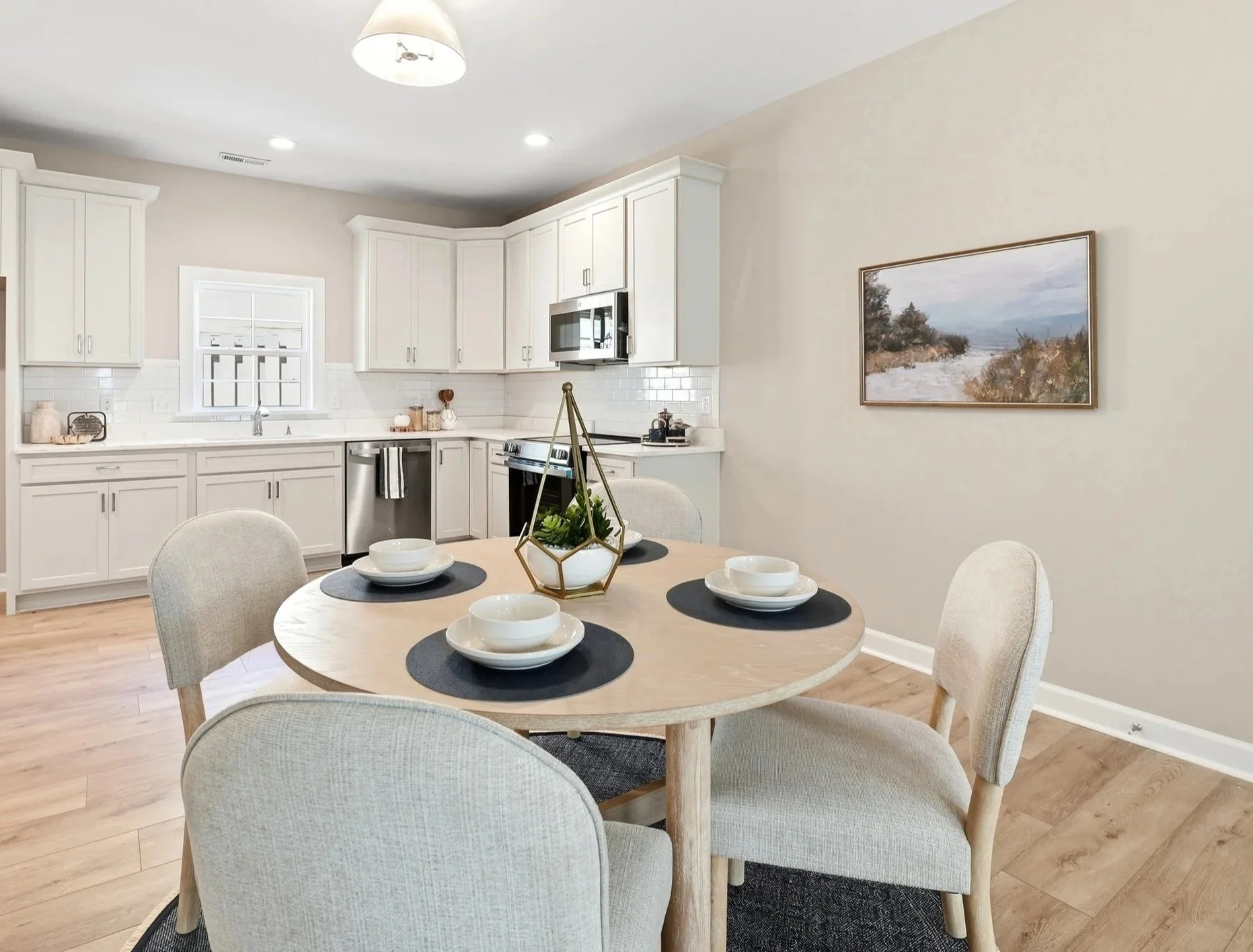 Round dining with blue accents showing layout