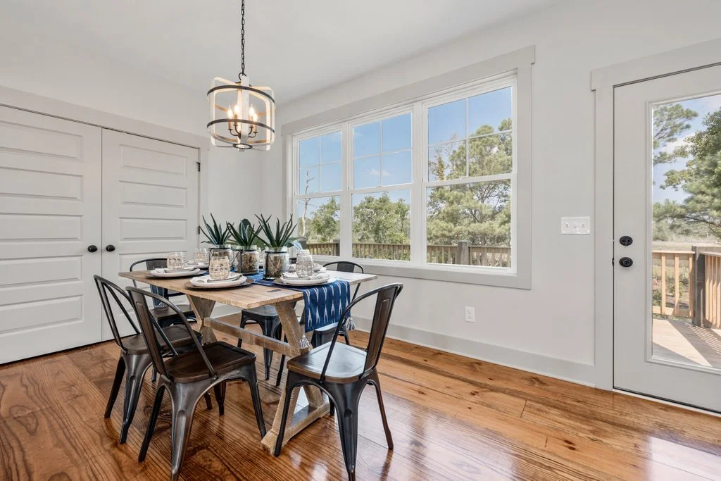modern rustic dining room staging with blue table runner in wilmington nc