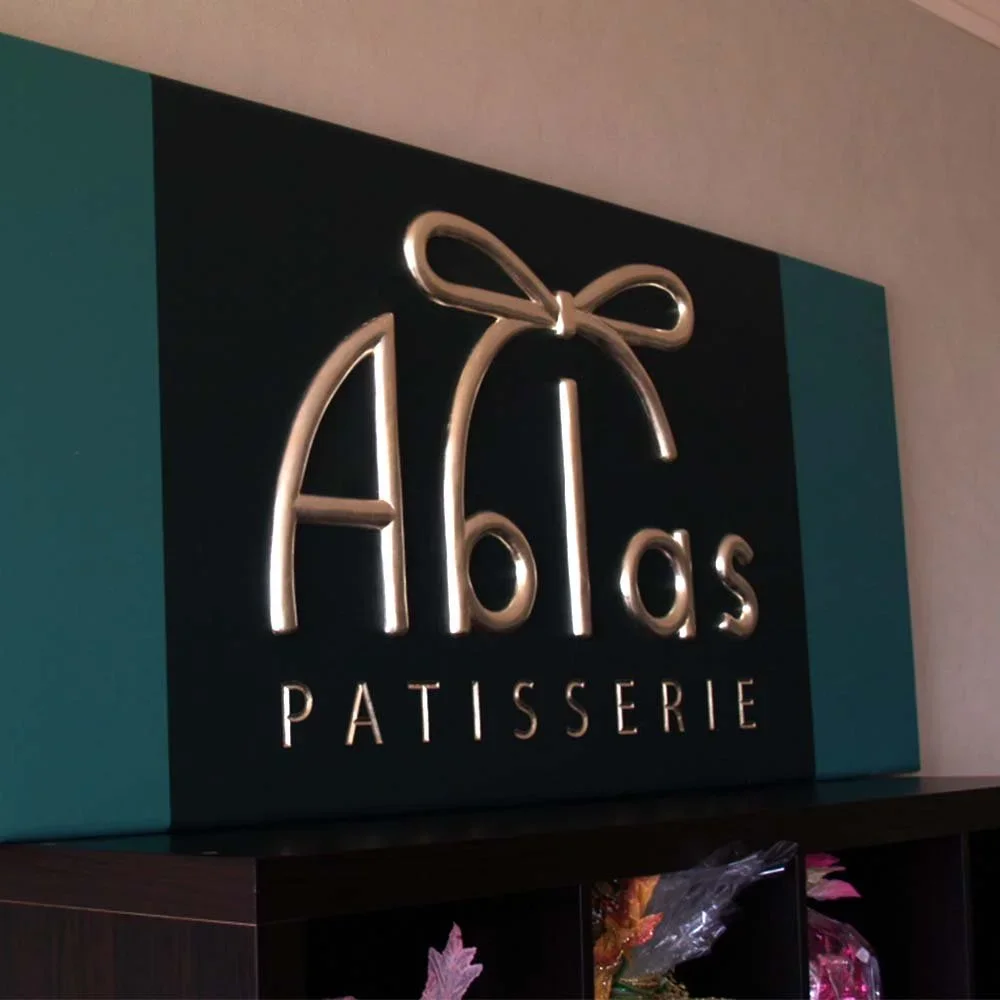 ablas-patisserie-logo-signage.webp