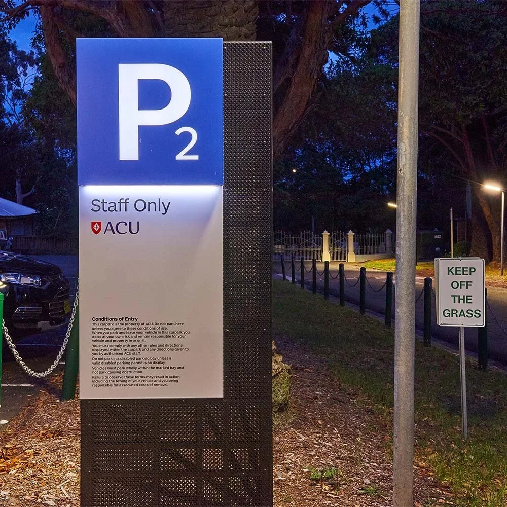 acu-strathfield-illuminated-parking-blade-sign.webp