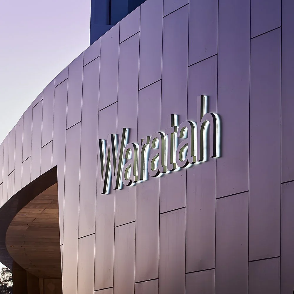 aveo-bella-vista-warratah-large-acrylic-letters-halo-lit.webp