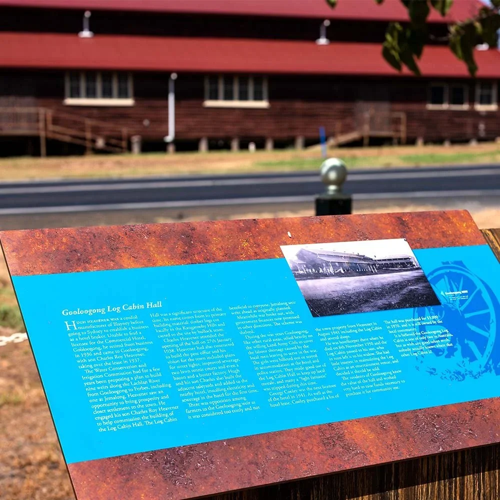 cowra-shire-council-gooloogong-log-cabin-sign.webp