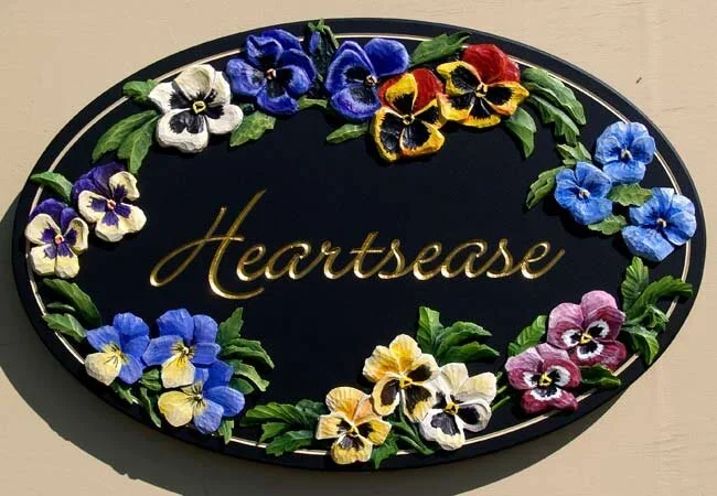 hearts-ease-house-sign.webp