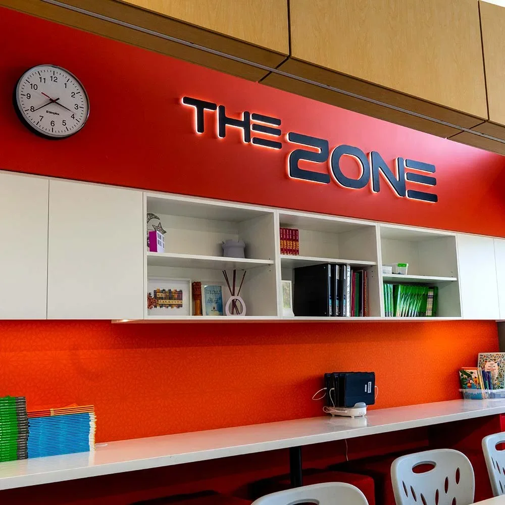 ilim-college-doveton-the-zone-illuminated-classroom-signs.webp