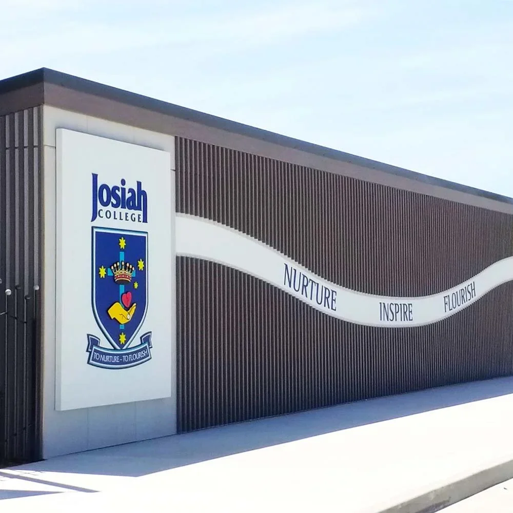 josiah-college-welcome-building-values-signage.webp