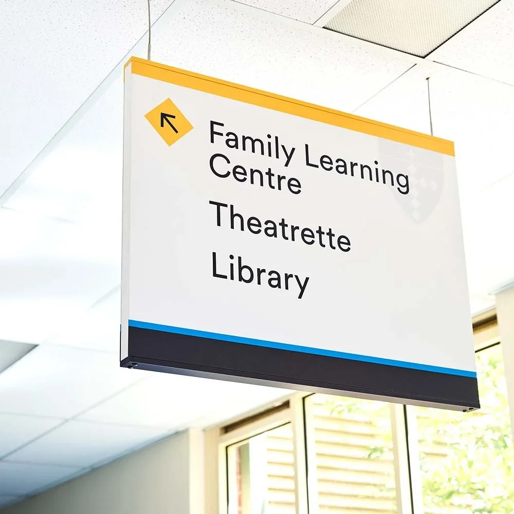 killester-college-suspended-corridor-directional-sign.webp