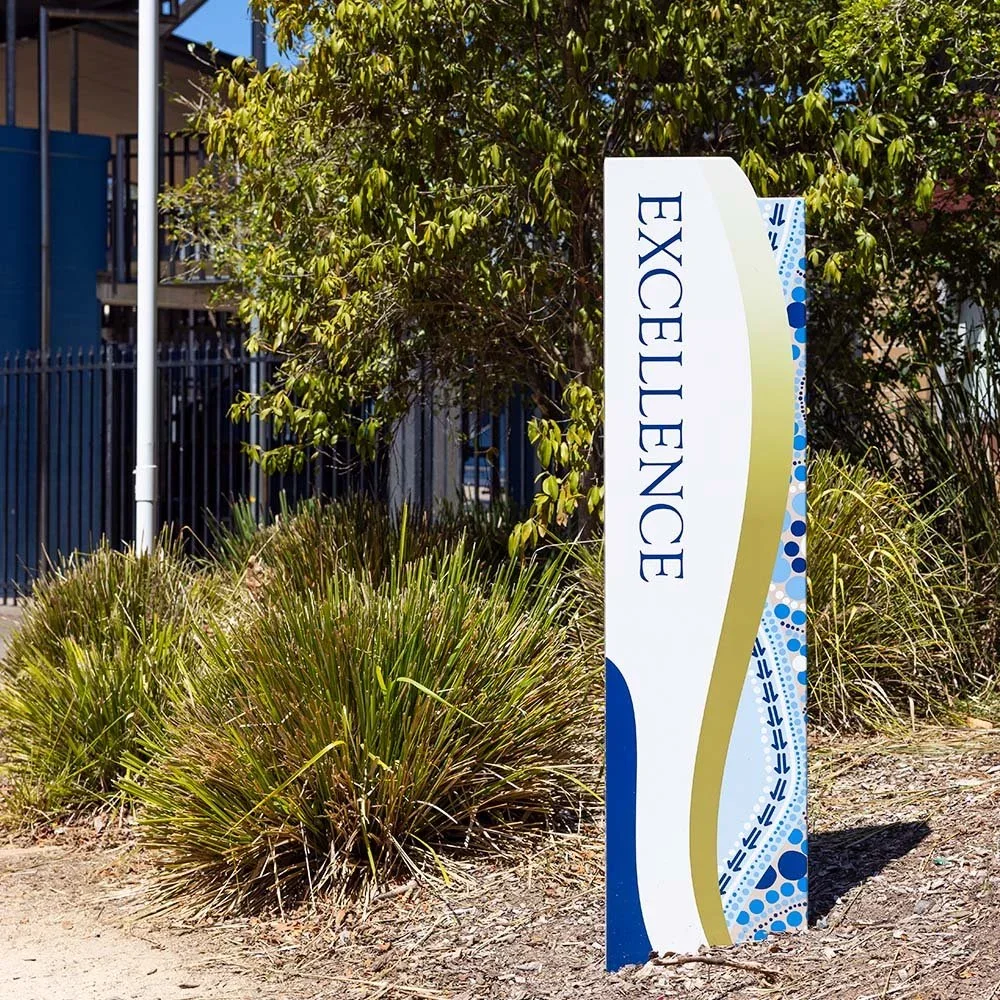 wadalba-community-school-values-totem-excellence.webp