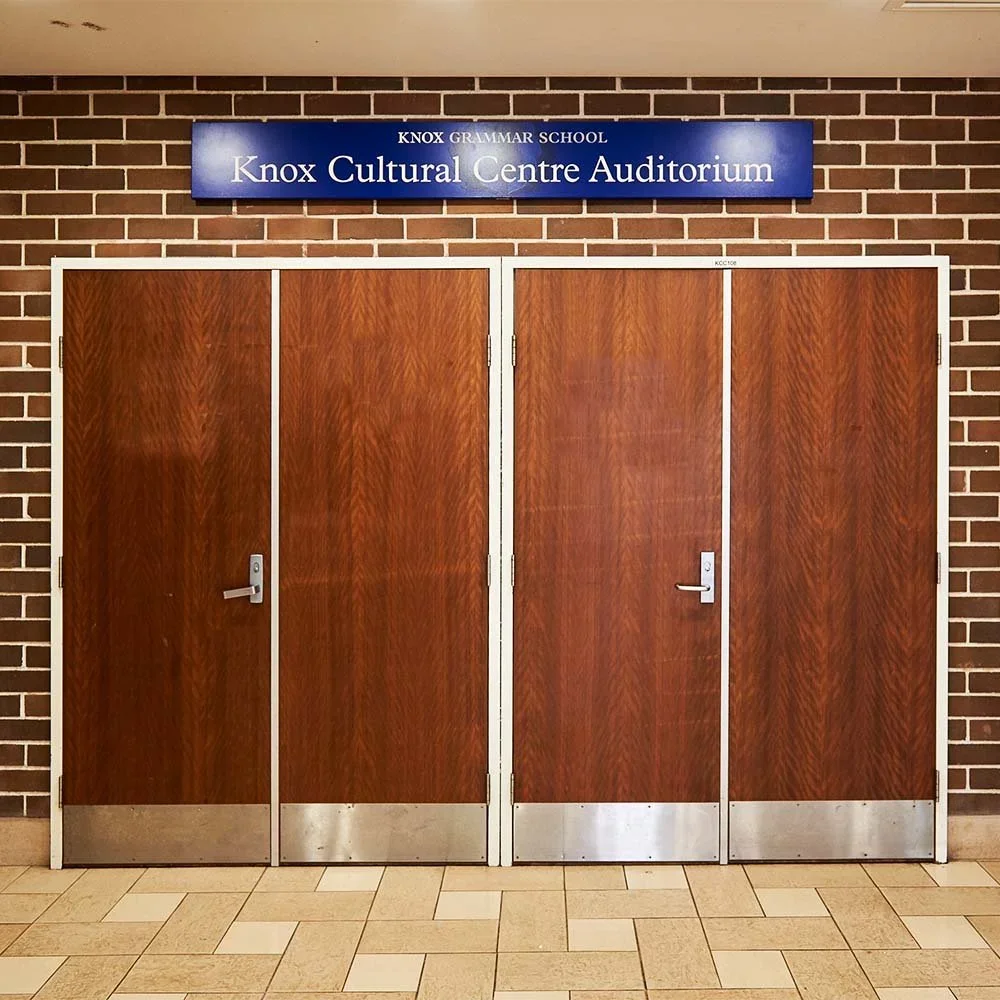 knox-grammar-school-deparment-identification-auditorium-sign.webp
