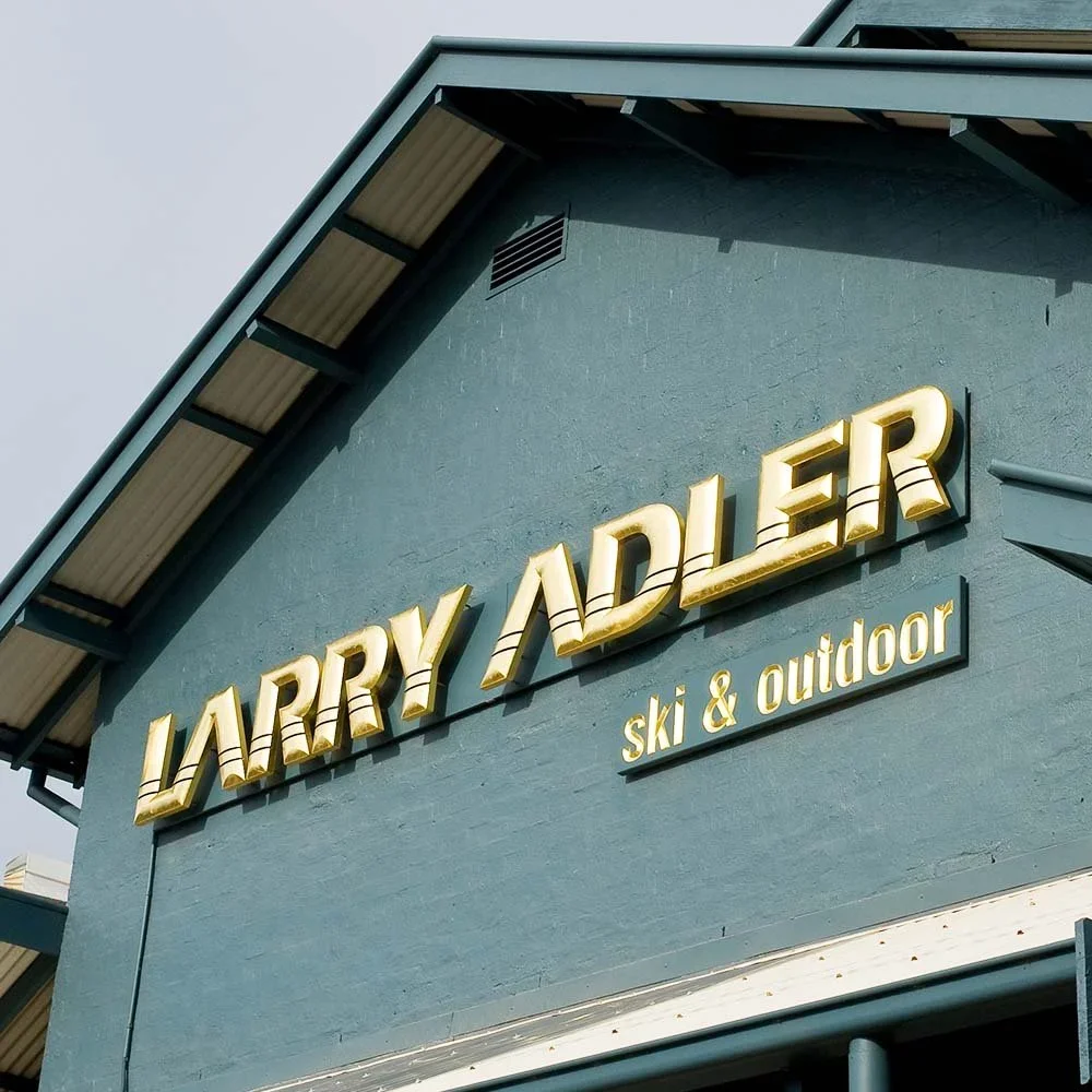 larry-adler-gilded-business-retail-signage.webp