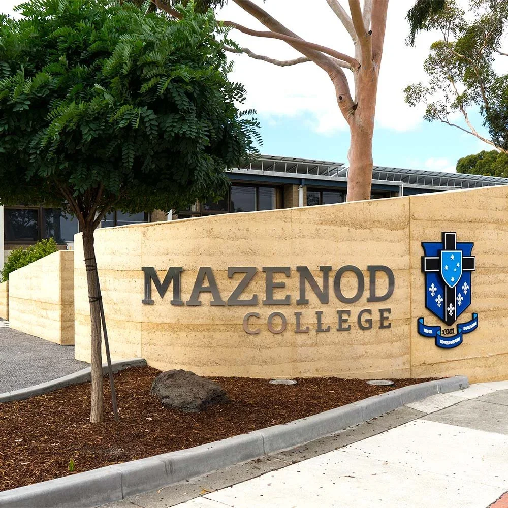 mazenod-college-mulgrave-rammed-earth-wall-signage.webp