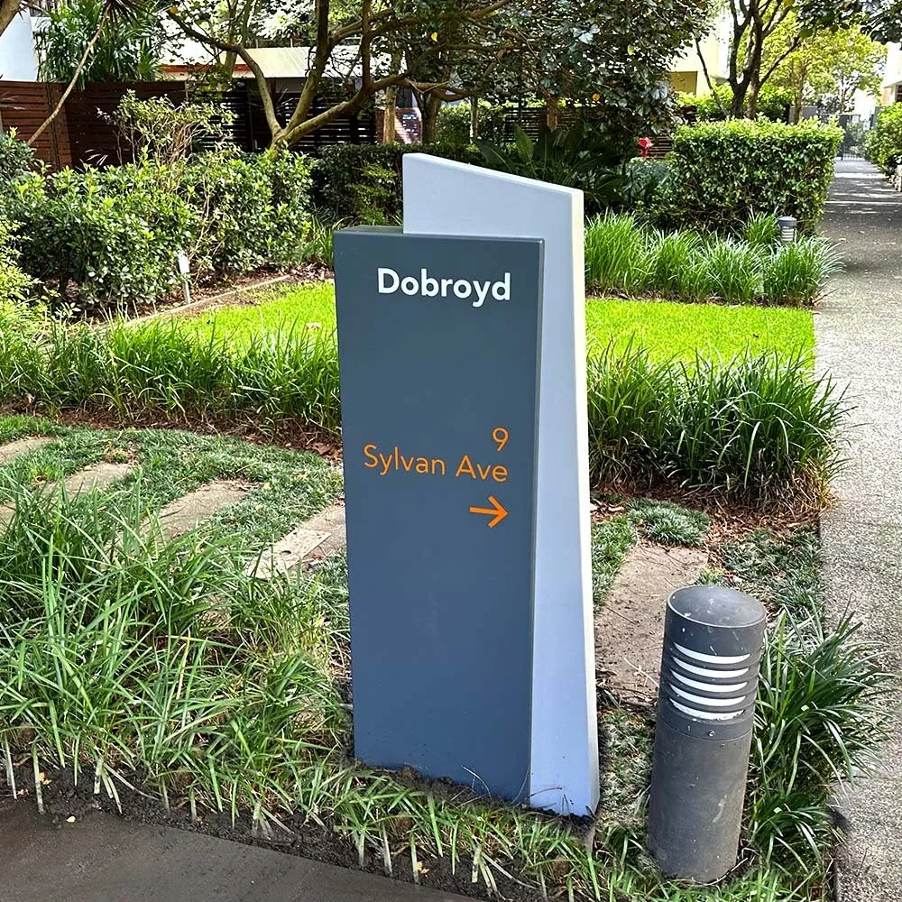 the-village-balgowlah-apartments-wayfinding-plinths-illuminated.webp