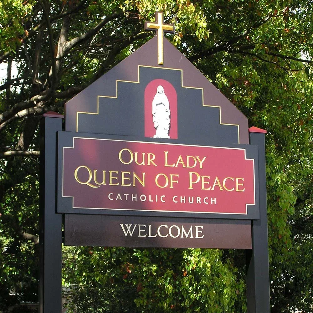 our-lady-queen-of-peace-gladesville-church-sign.webp