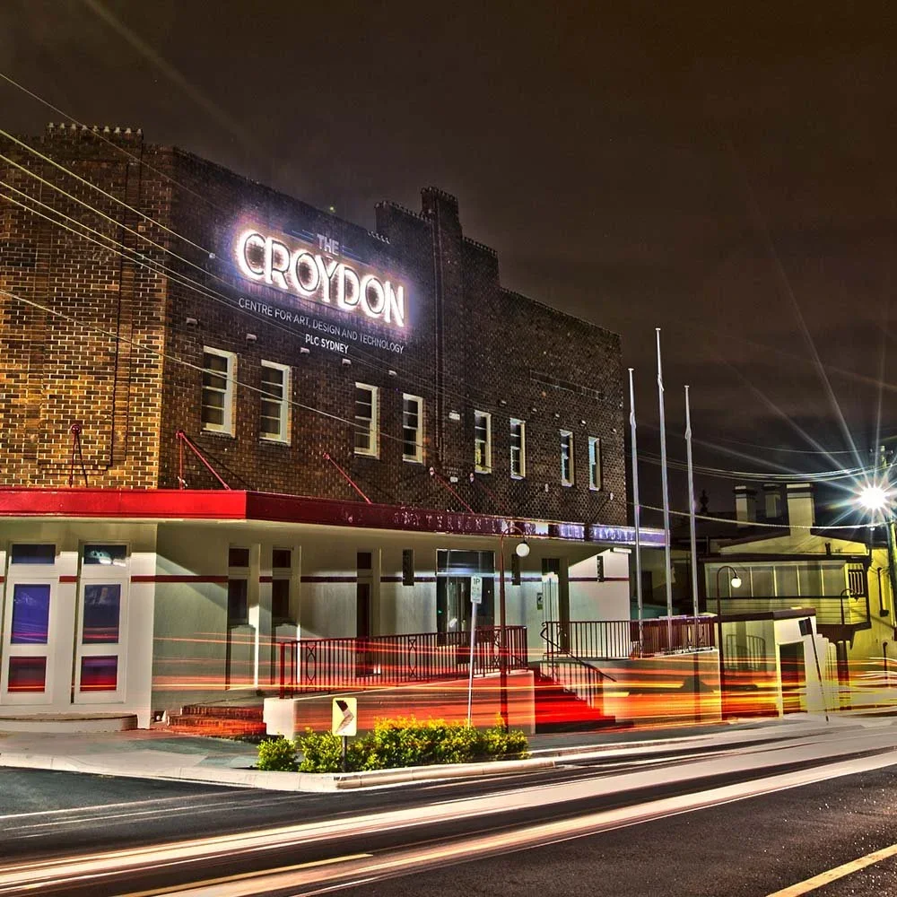 plc-sydney-the-croydon-illuminated-building-signage-night.webp