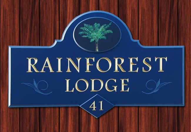 rainforest-lodge-house-sign.webp