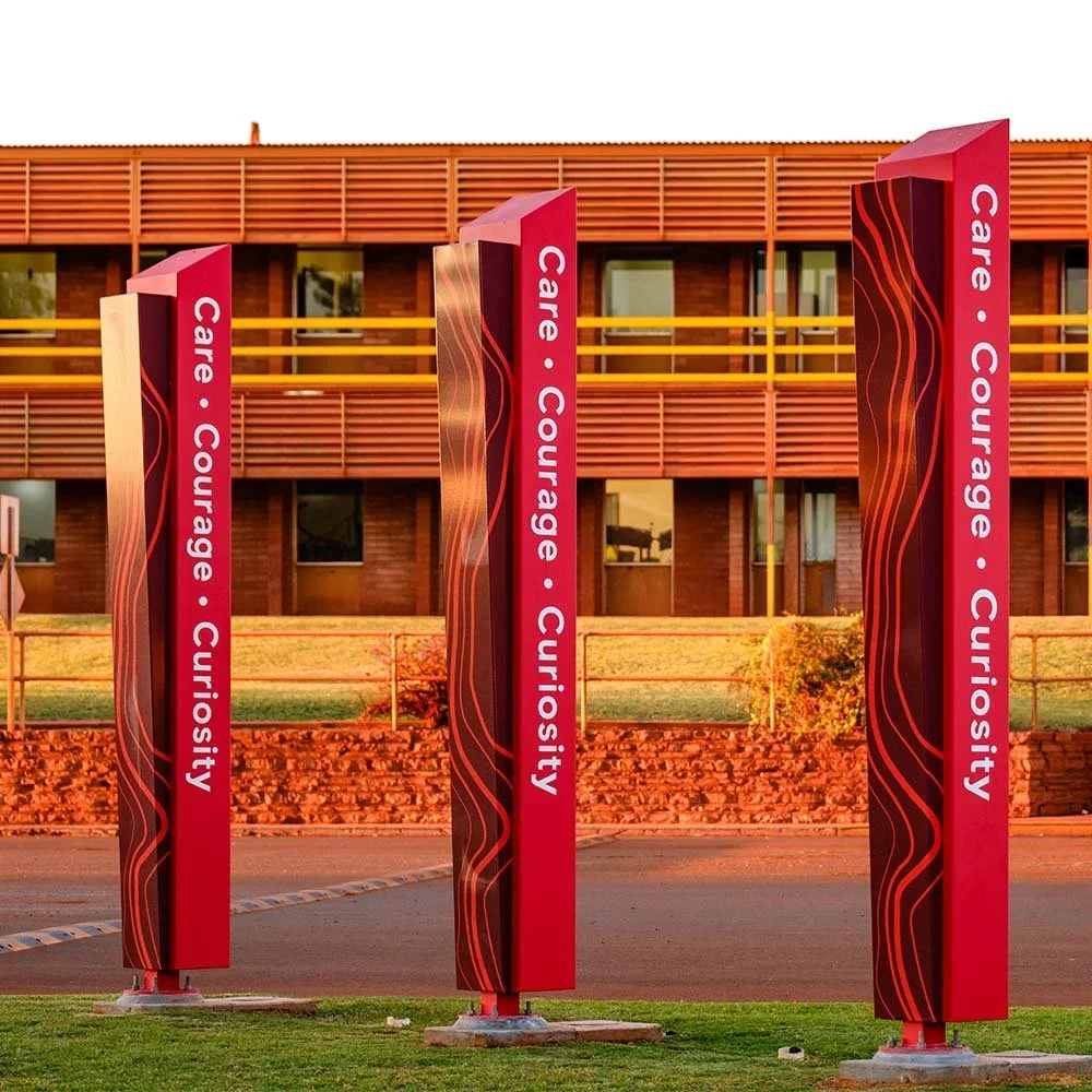rio-tinto-paraburdoo-company-values-pillar-signs-western-australia.webp