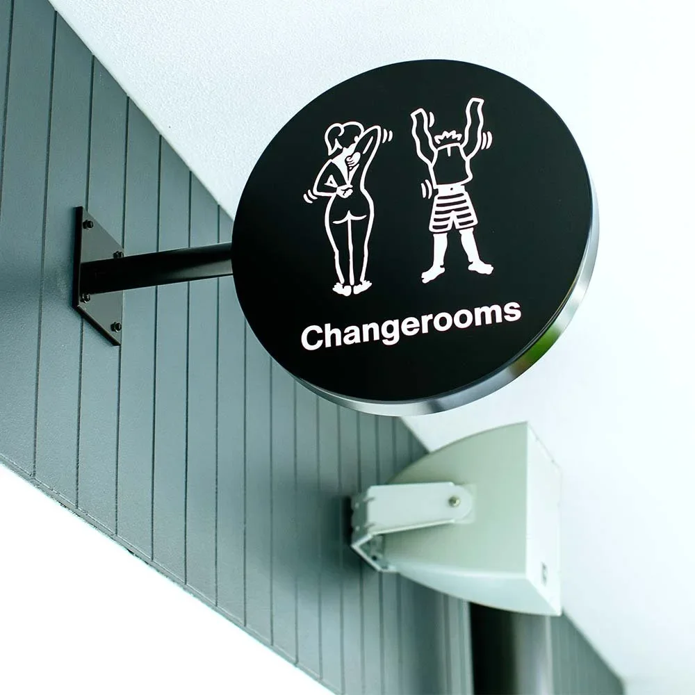 urbnsurf-sydney-blade-round-cantilever-change-room-sign.webp