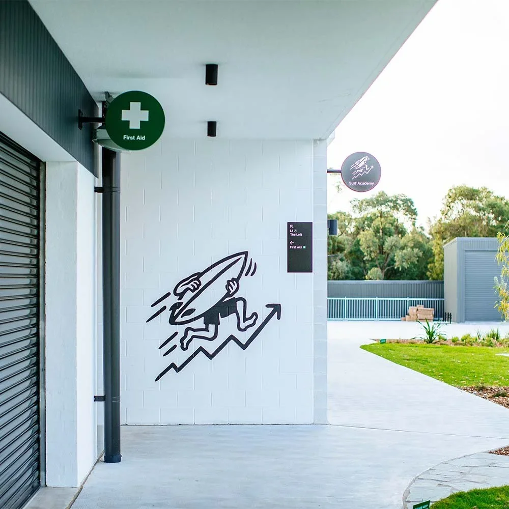 urbnsurf-sydney-blade-and-wall-mount-wayfinding-signs.webp