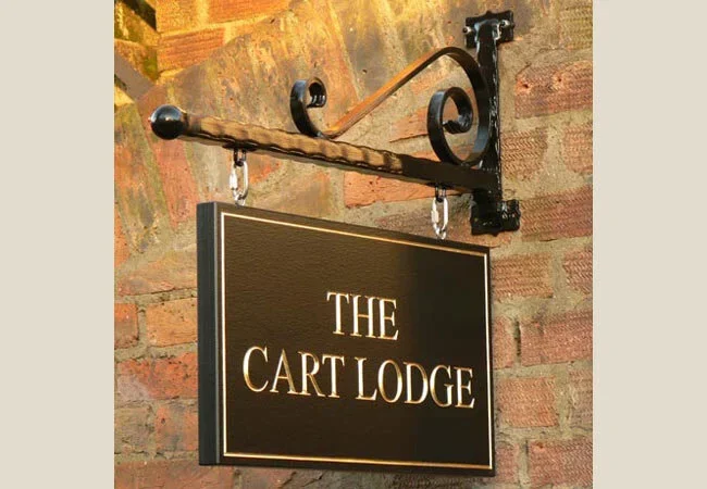 the-cart-lodge-house-sign.webp