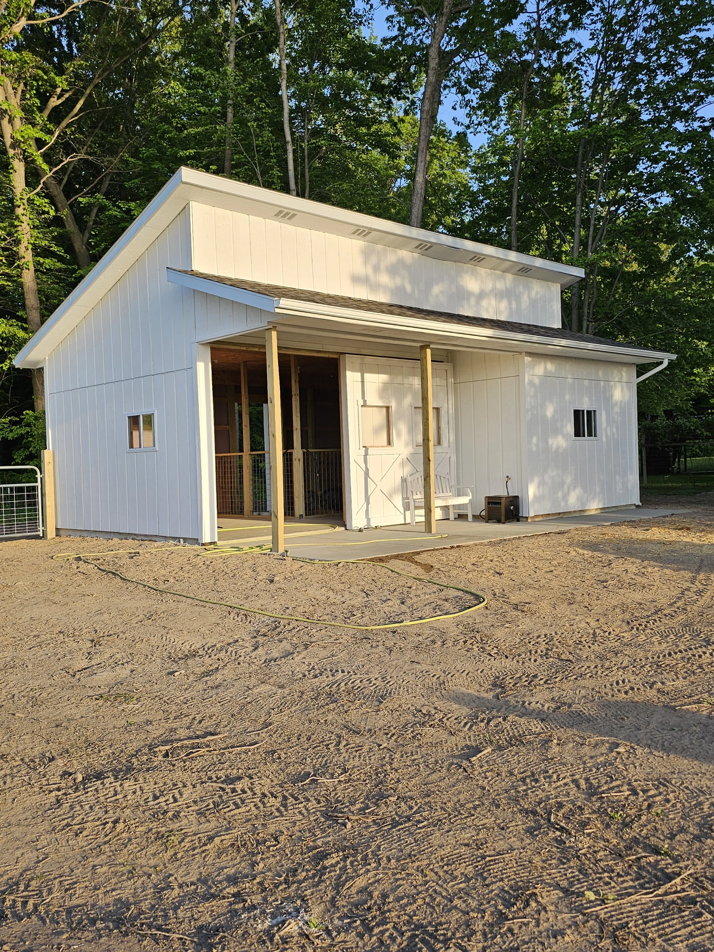 This custom barn built by Oakland construction met the customers design ideas and made it reality with functionality for the livestock and storage needs.