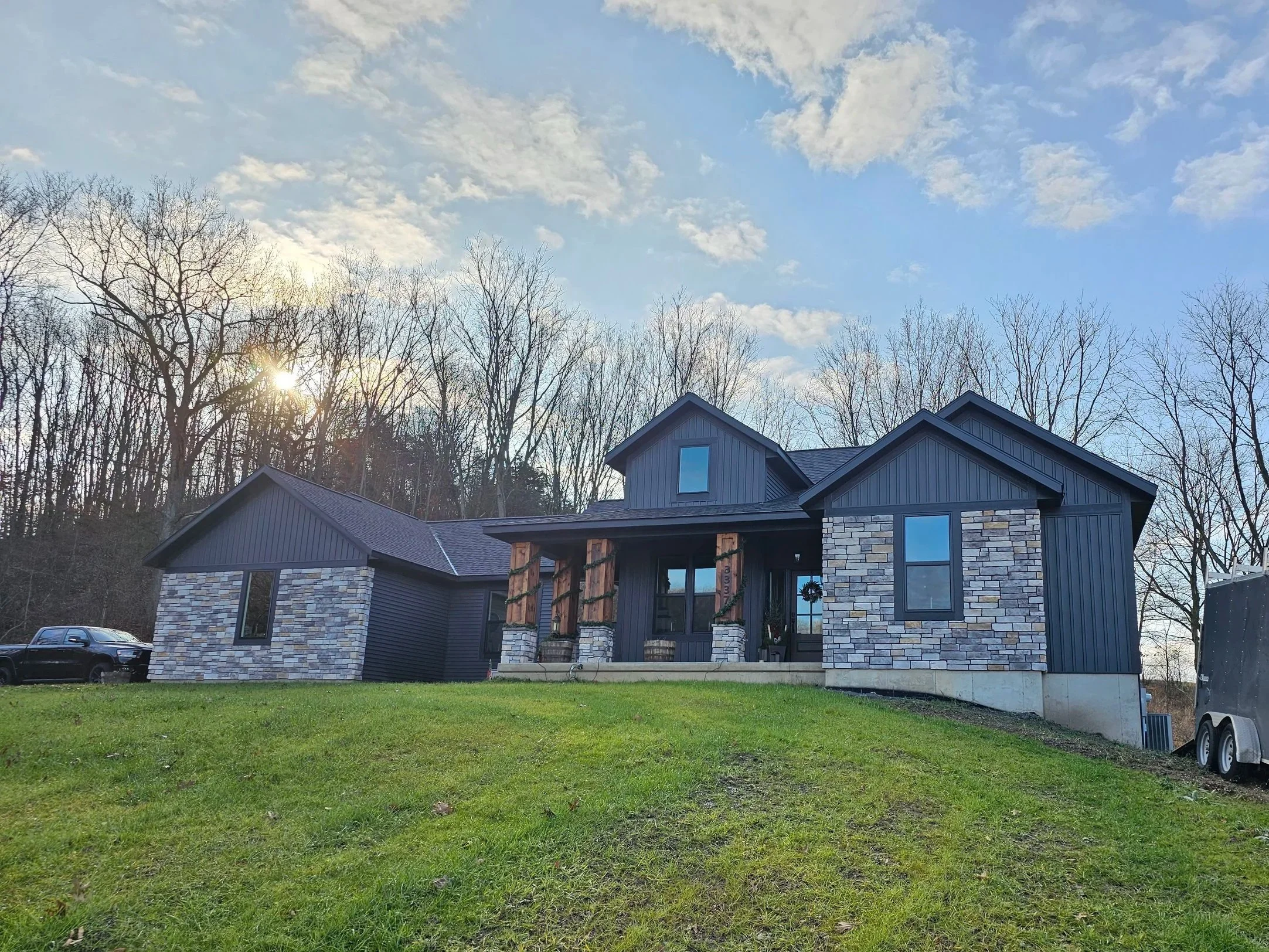 This impressive home built by Oakland Construction is seated neatly into a hill with a beautiful view across the 10 acre parcel it commands.