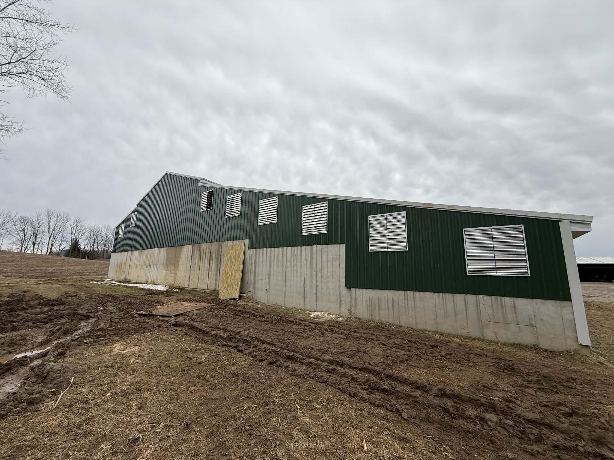 Rebuilding a major roof renovation on this agricultural barn project with Oakland Construction.
