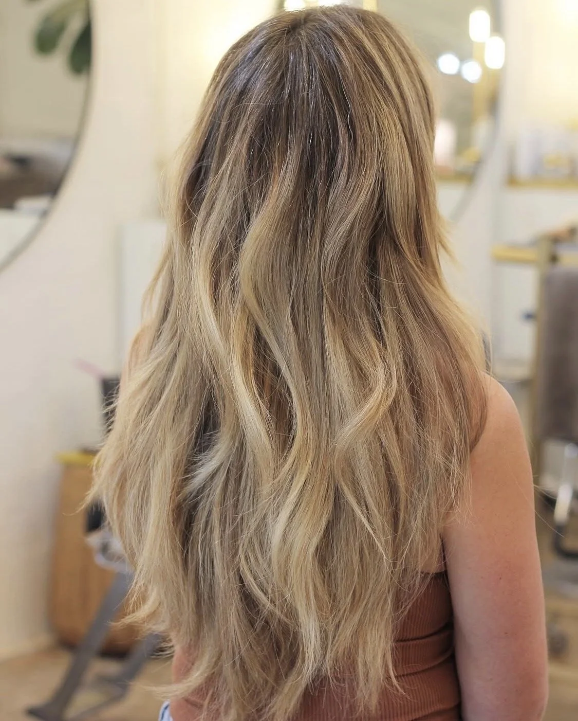 Beachy blonde balayage by Chelsea Fishburn at Sienna House Austin.