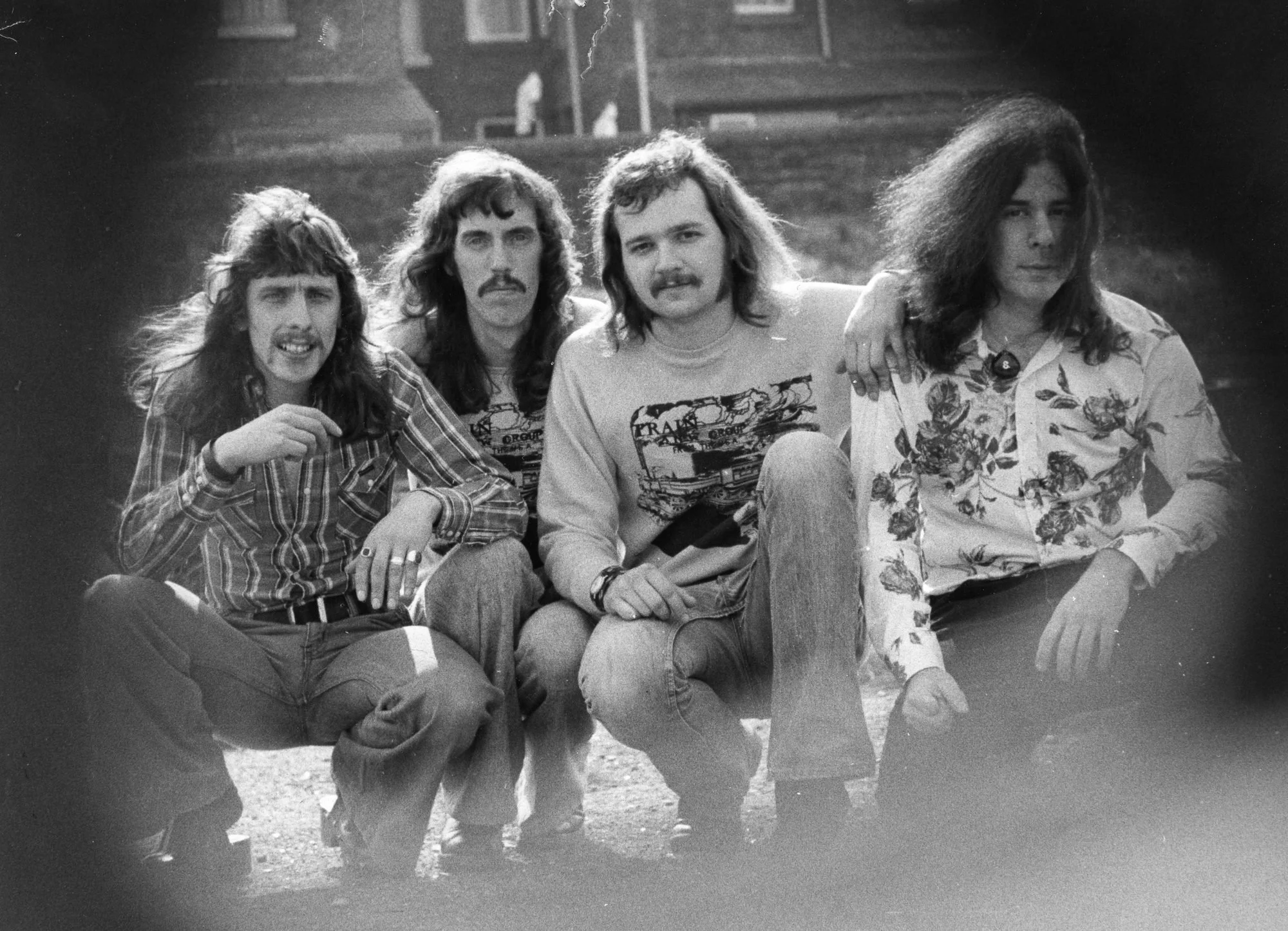 Train, promotional photo, railroad yard, Liverpool, England, 1976