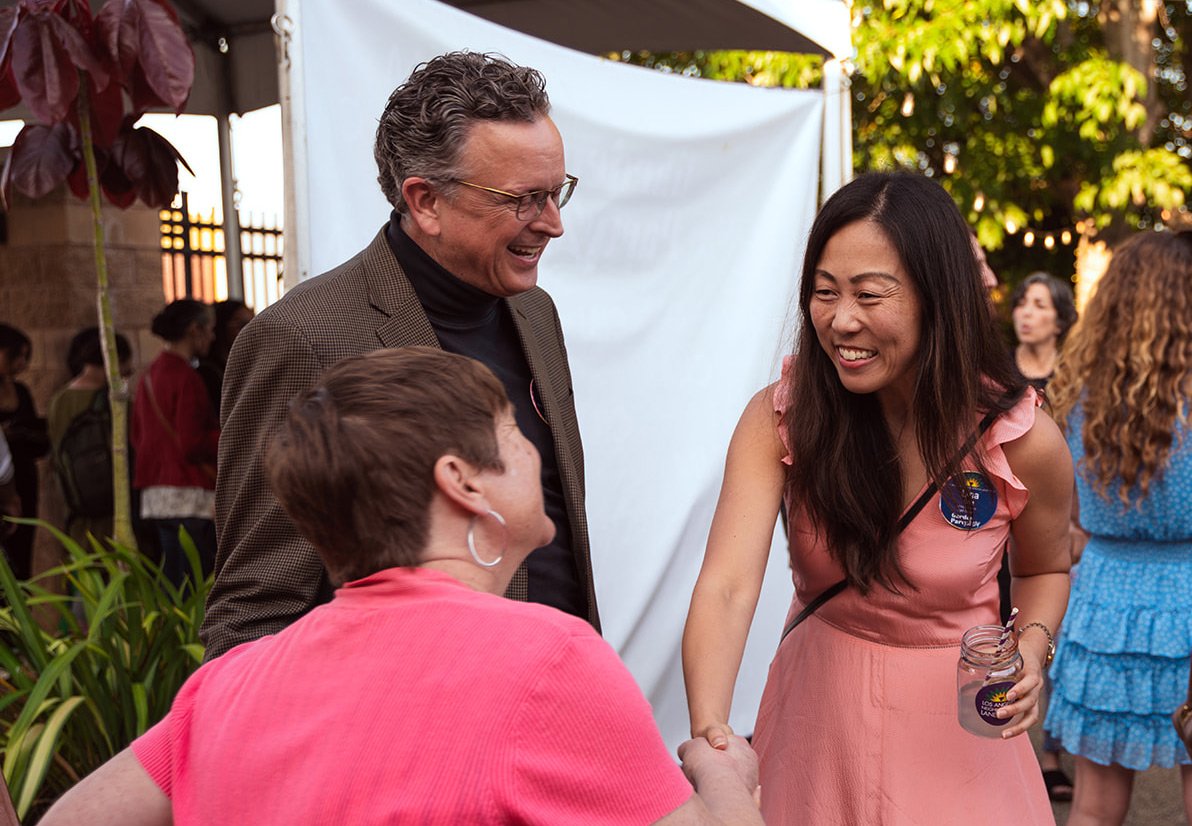 Photo of people meeting at an event Party for the Parks