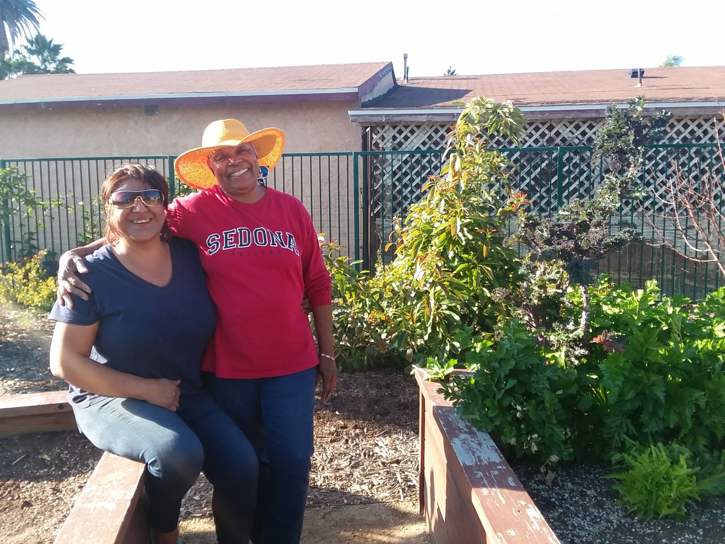 Guadalupe Zapata and Margaret Webb, gardeners from Fellowship Garden of Love at Holmes.