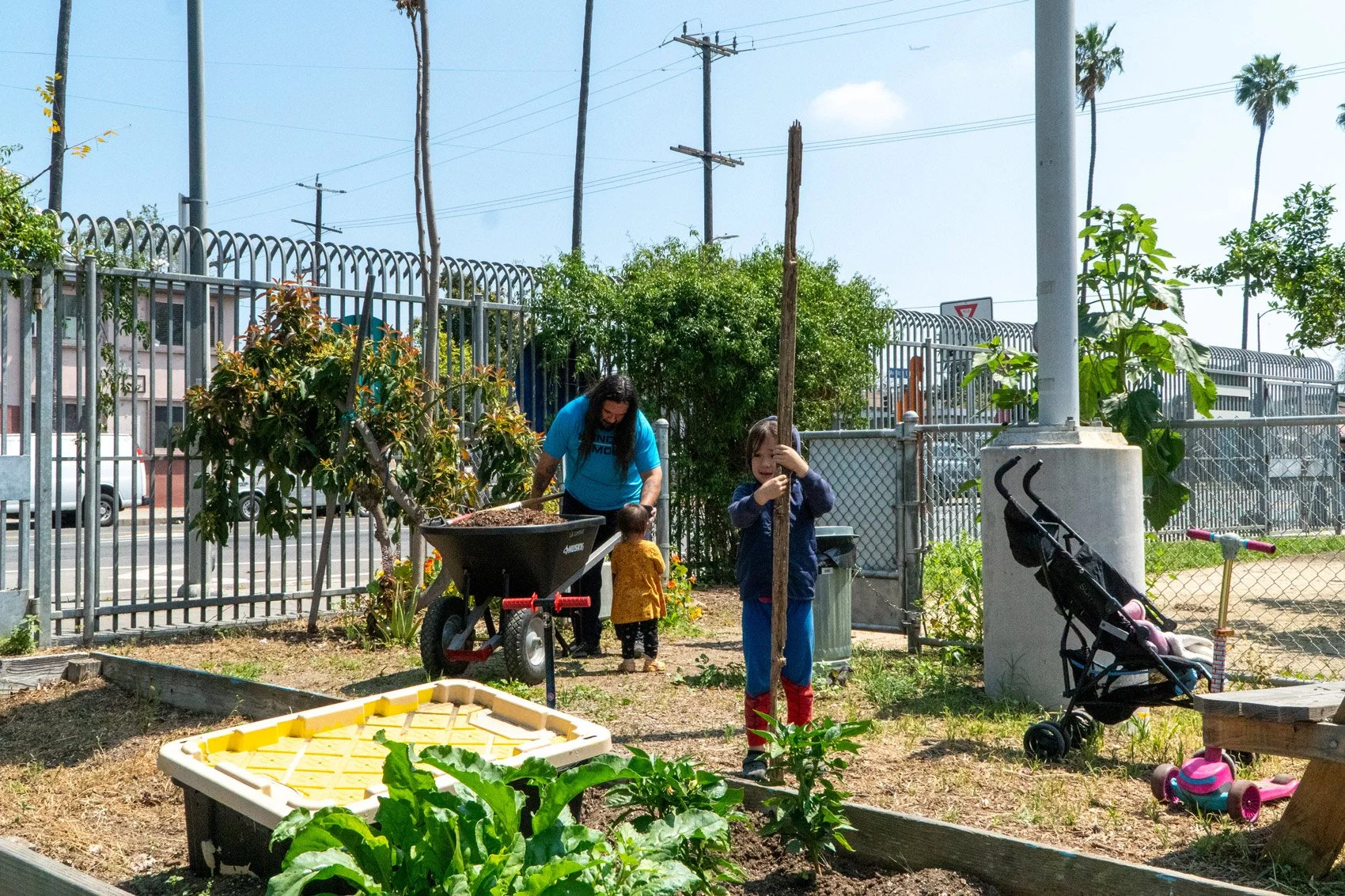 Photo of family working in the garden
