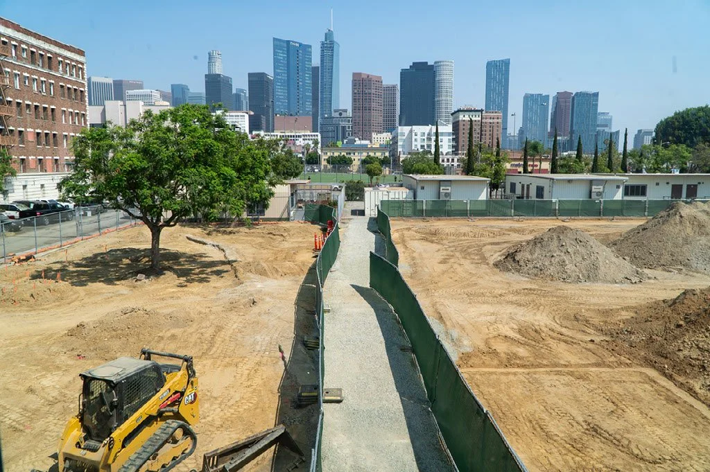 Photo of construction site with LA skyline in the background