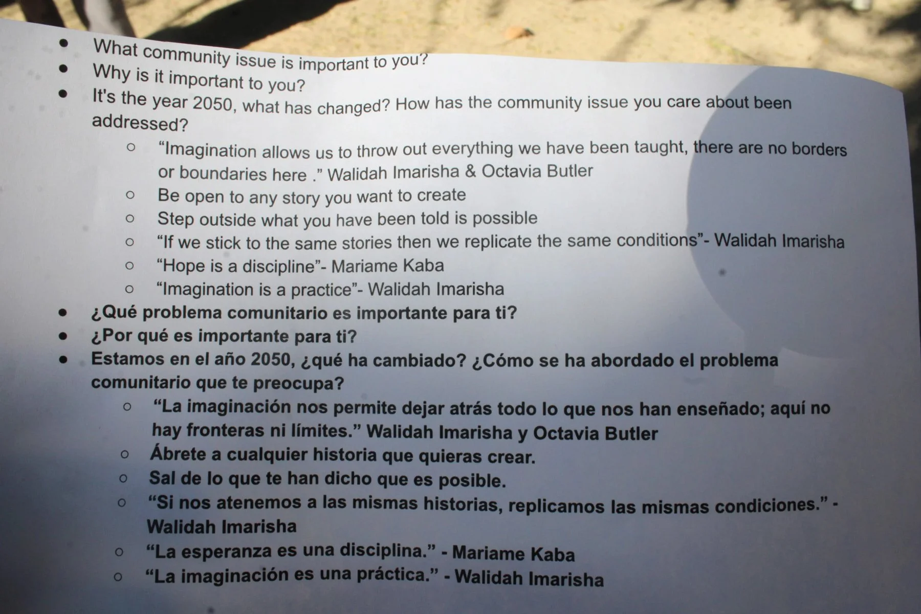 Photo of sheet of paper listing various questions like What does community mean to you?