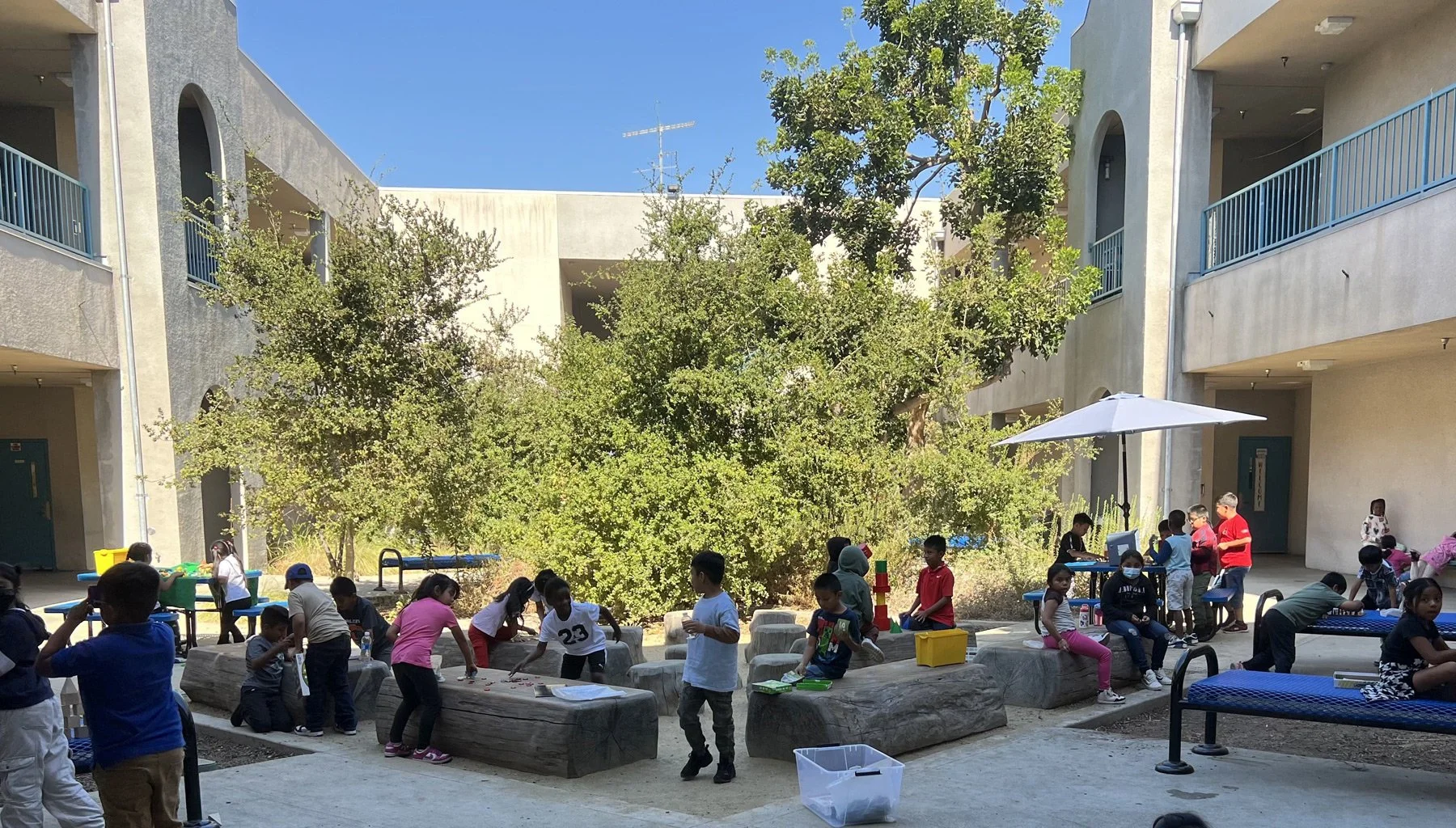 Photo of kids playing in the Esperanza courtyard