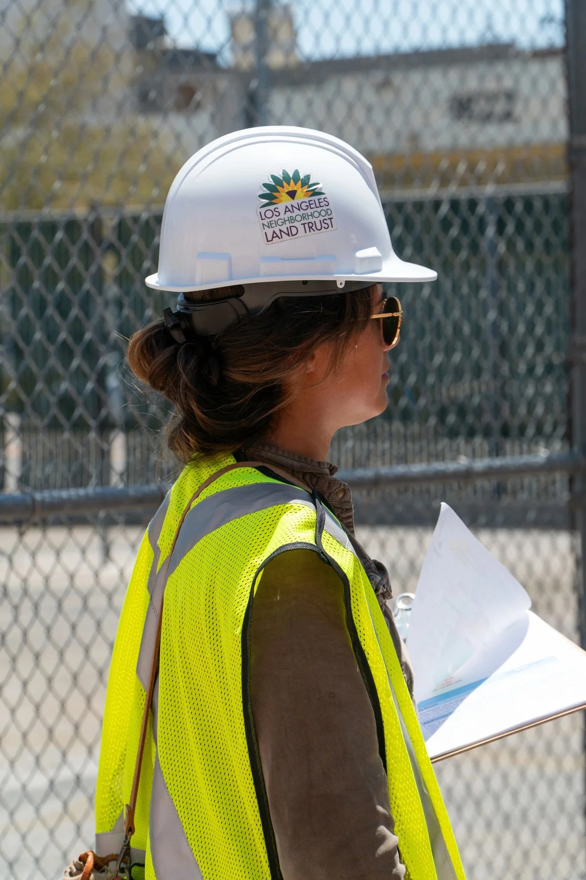 Photo of Adriana in a hard hat