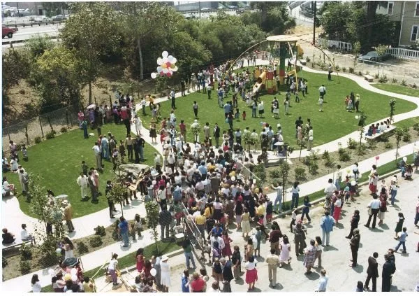 Vintage photo of large crowd at Estrella Park opening in 1981.