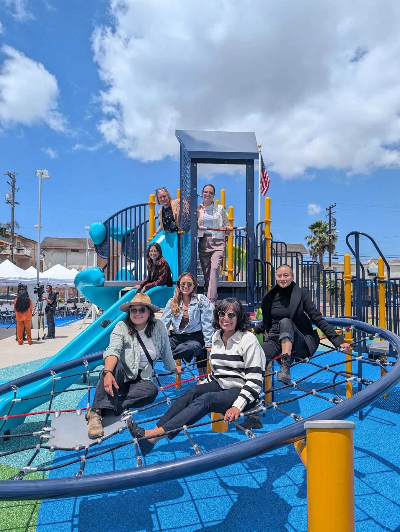Photo of LANLT posing on a playground in the park