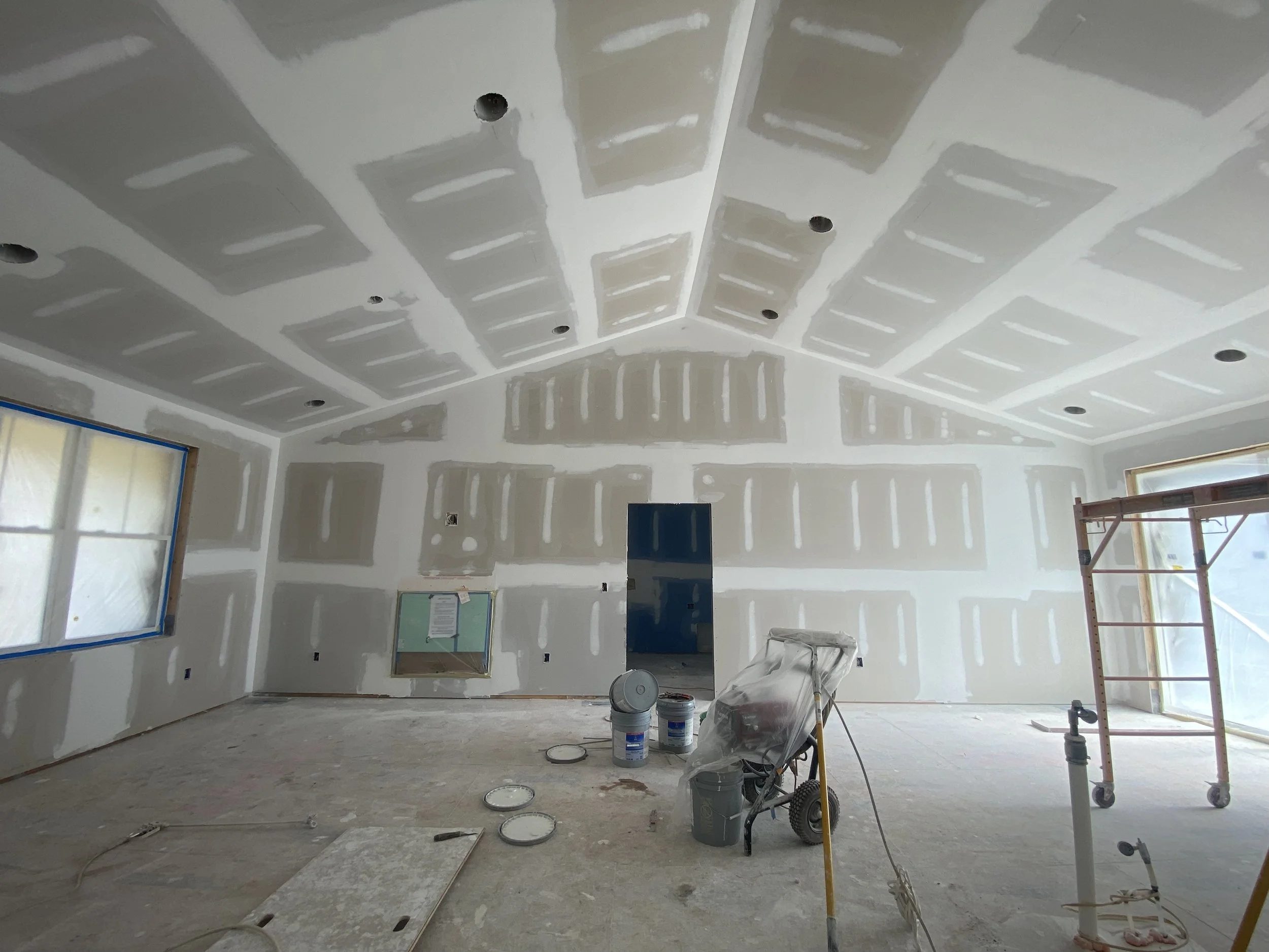 Custom home great room under construction in Western North Carolina by Plumb Level Square