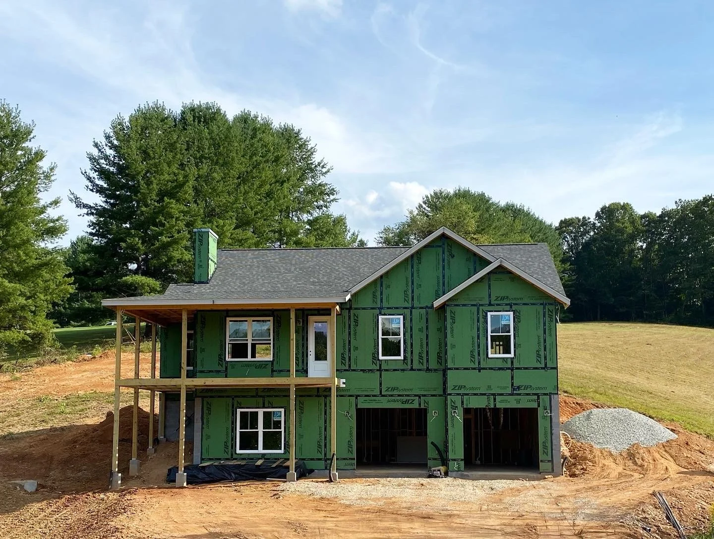 Exterior view of new construction home in Leicester, NC by Plumb Level Square