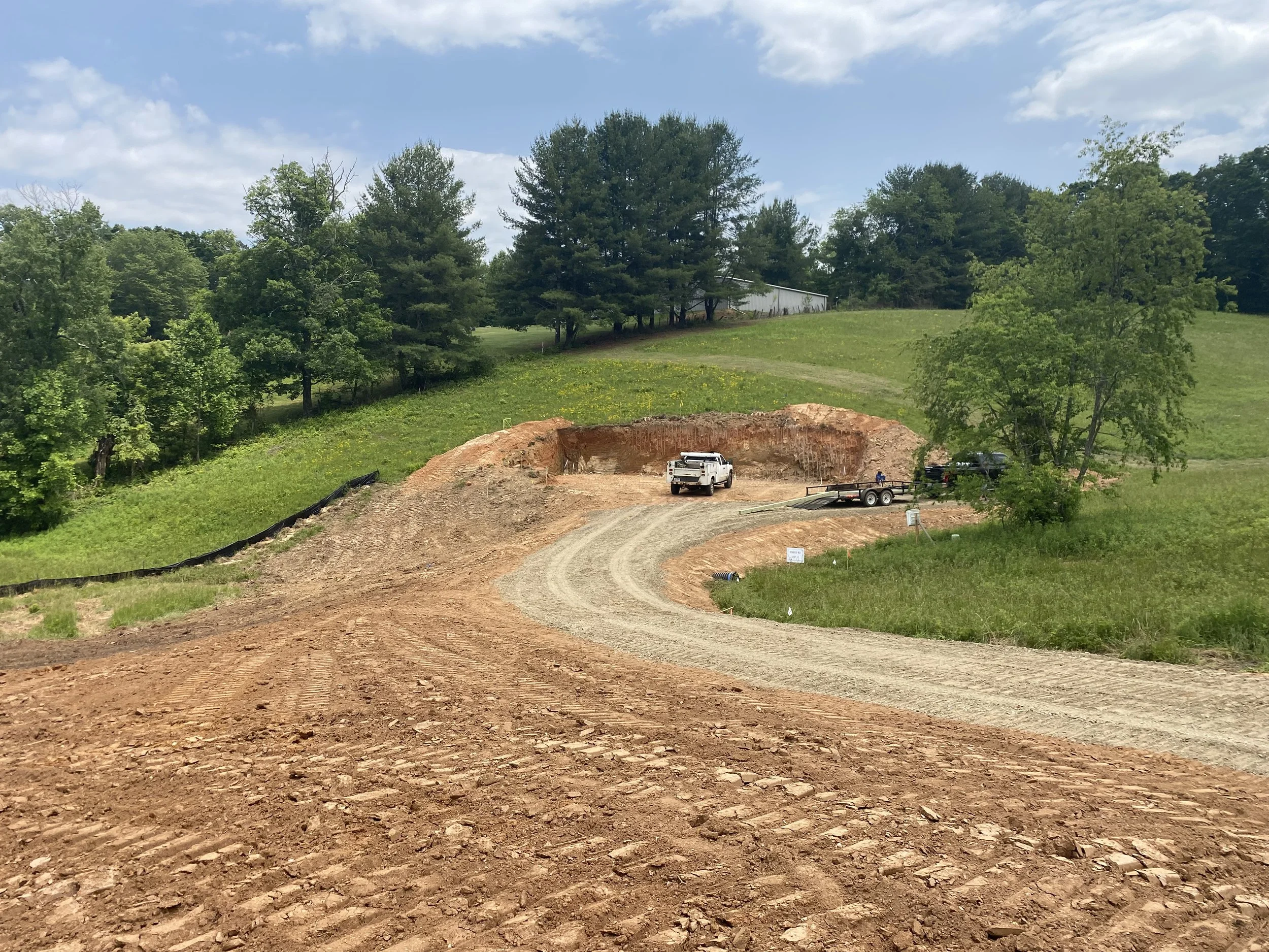 Grading of a new home site by Plumb Level Square custom home builders