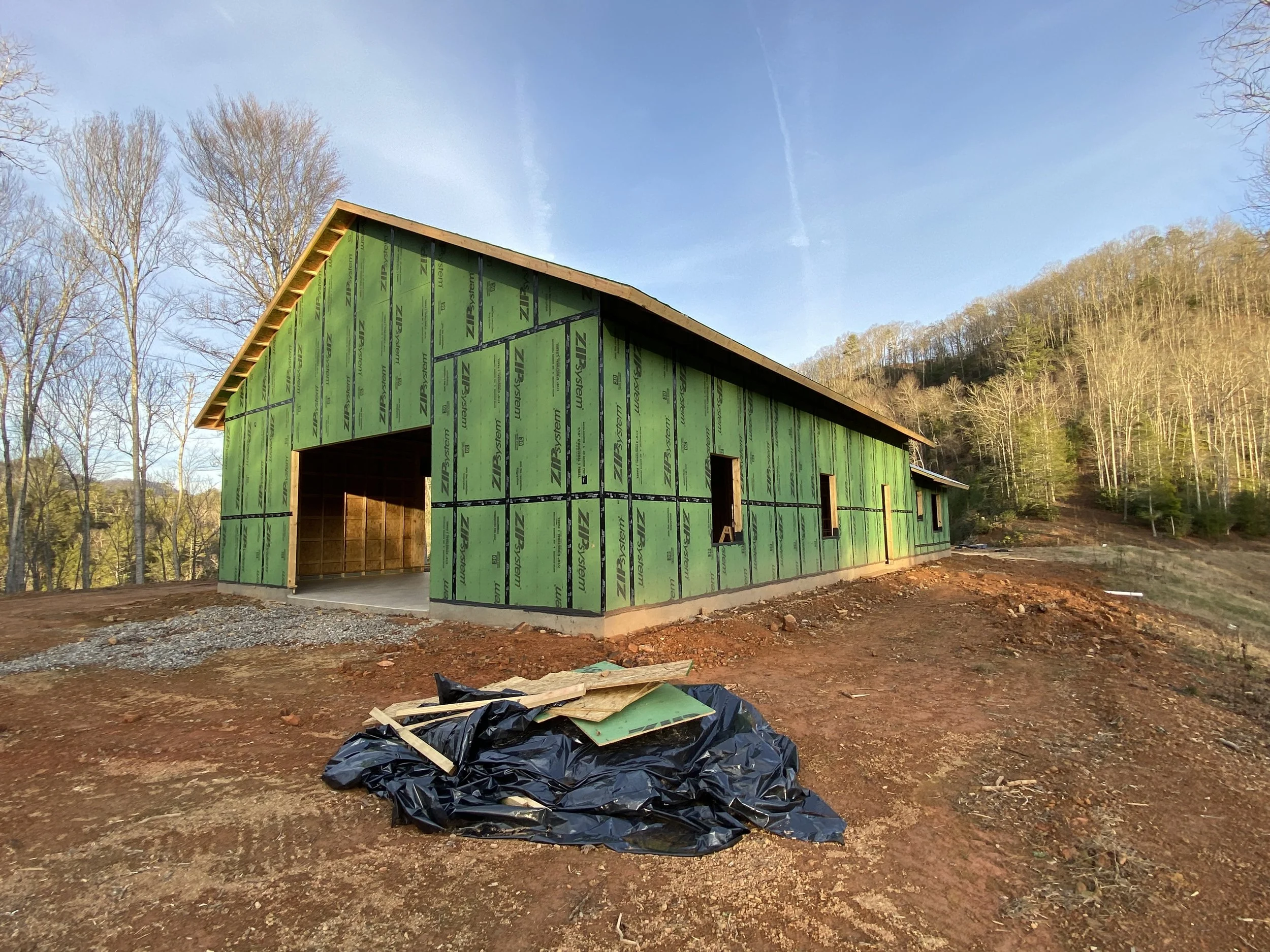 Barndominium under construction by Plumb Level Square custom home builders in Asheville, NC