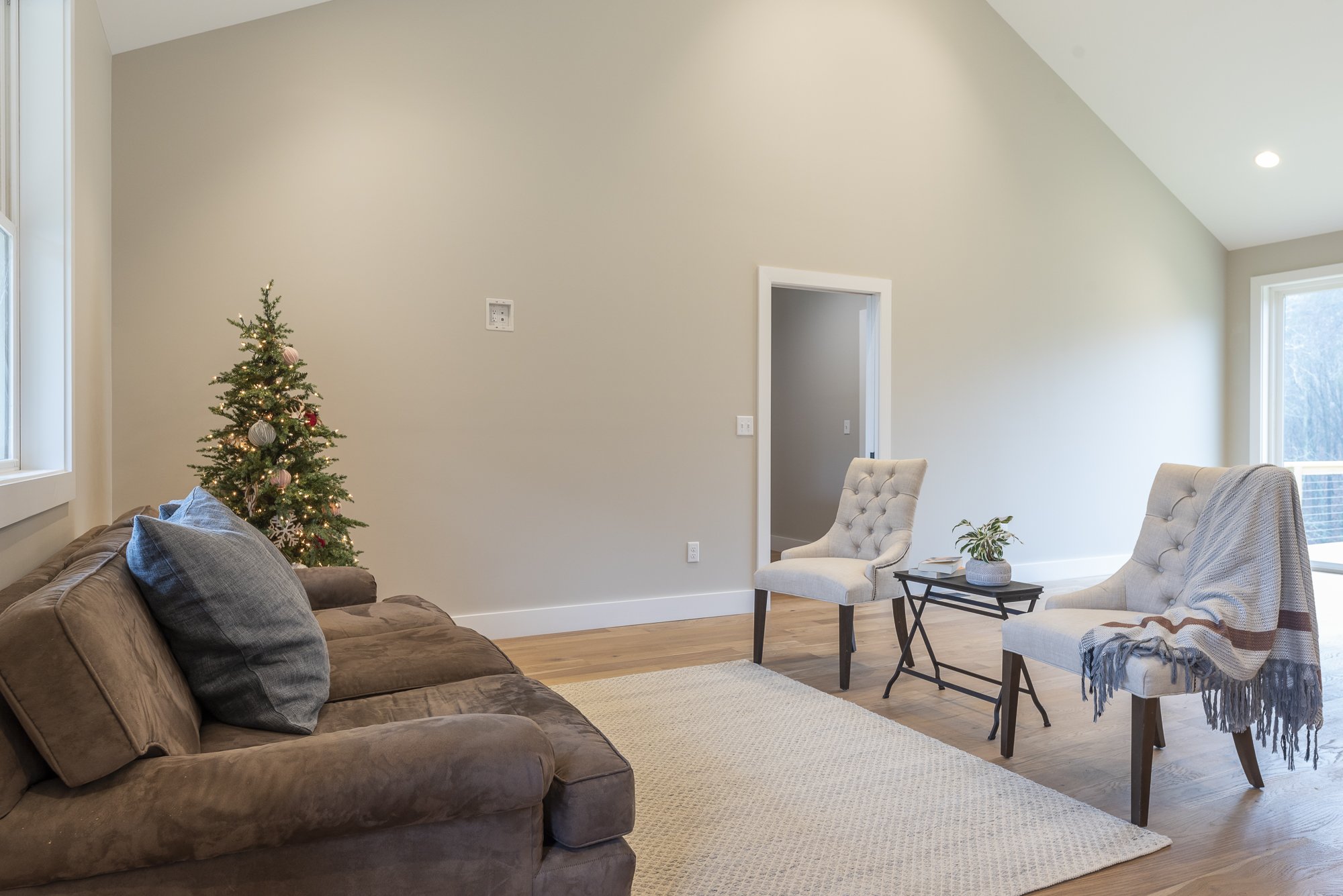 Great room in a modern farmhouse constructed by Plumb Level Square builders in western North Carolina