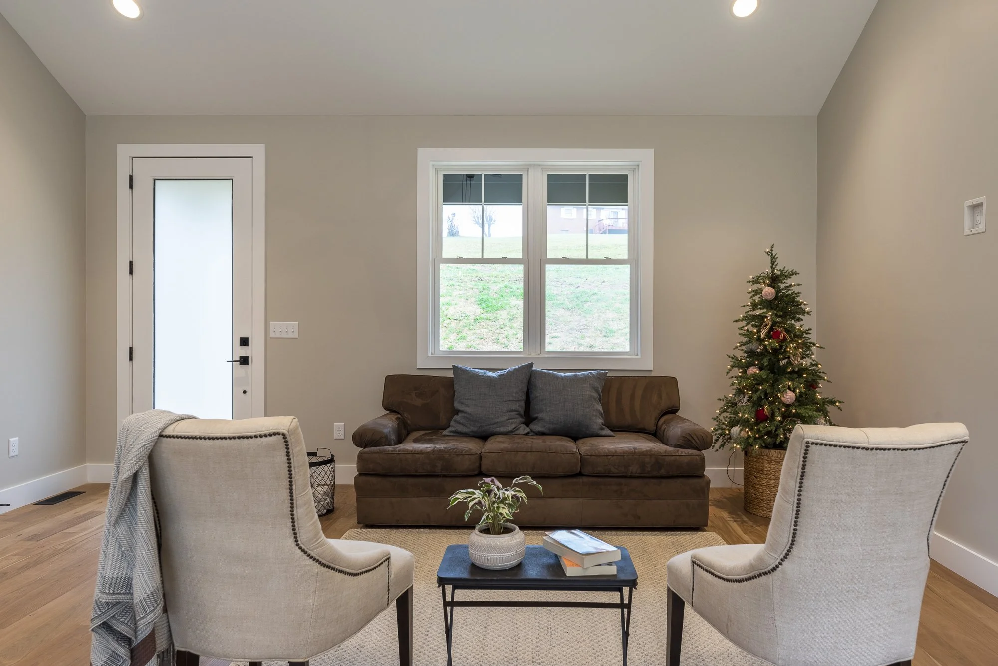 Great room in a modern farmhouse constructed by Plumb Level Square builders in western North Carolina